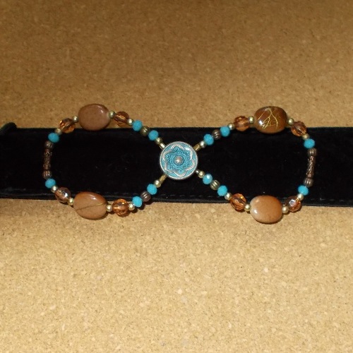 Antique Torquoise Infinity barrette made and supplied by Longhaired Jewels