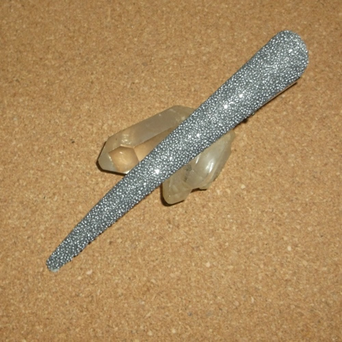 Scrunci silver colour curved beak clip supplied  by Longhaired Jewels